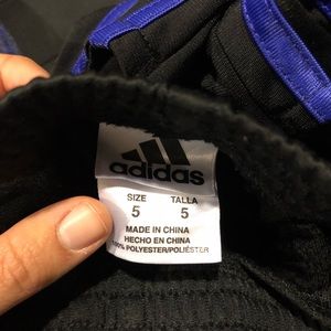 Blue zip up hoodies and two sweatpants